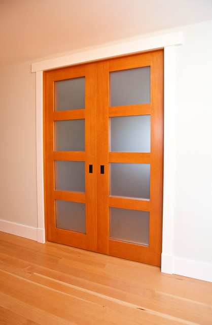 Custom wood pocket doors contemporary-
