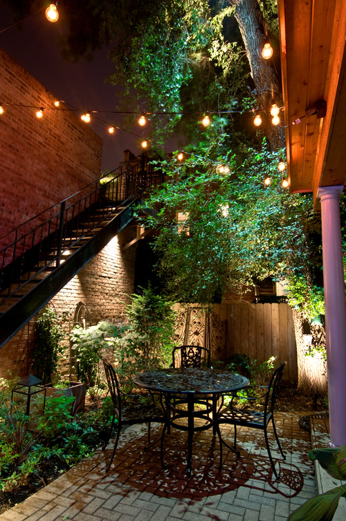 Small outdoor area lighting ideas. Photo credit: Traditional Patio by Joliet Lighting Outdoor Accents