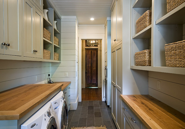 traditional laundry room by The Berry Group