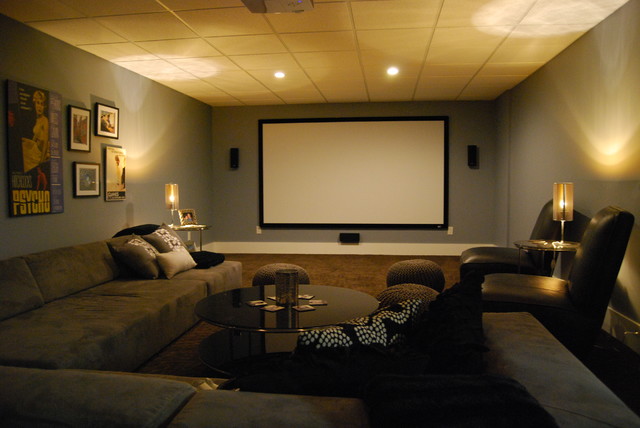 Basement media room with sectional sofa and giraffe texture ...