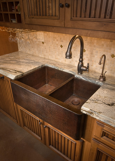 dark kitchen shelves with light counter tops