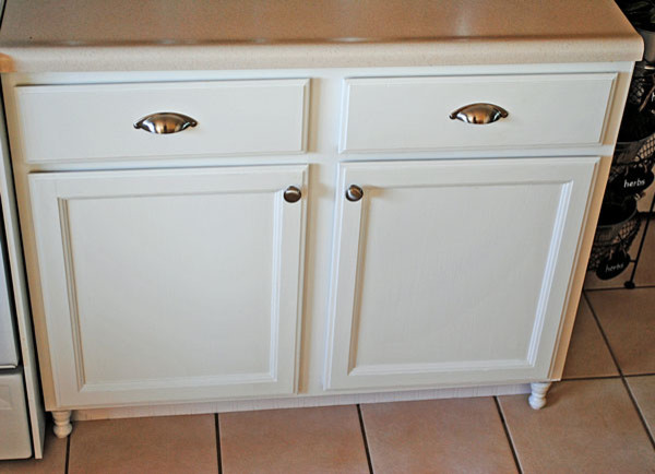 DIY Kitchen Cabinet Feet - Eclectic - Kitchen - by At The Picket Fence