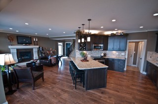 Great room includes kitchen with diagonal dining counter.