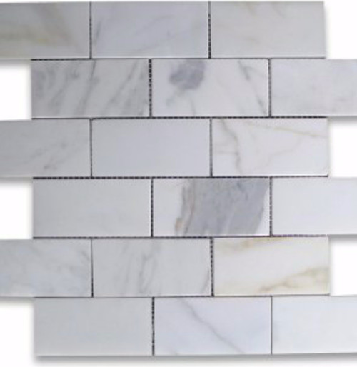 marble look alike countertops with real marble backsplash?