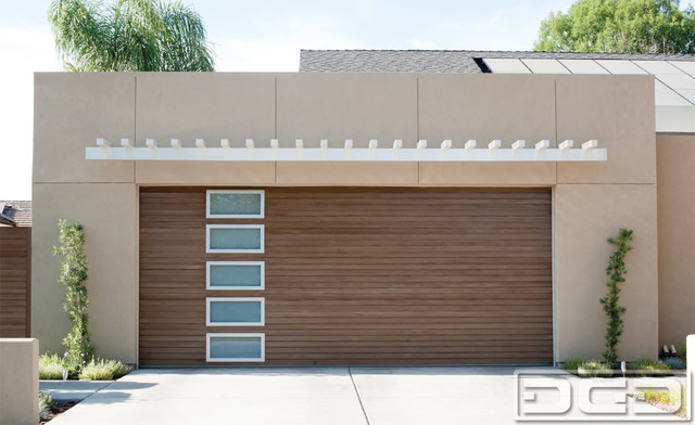 Modern Garage Doors by Dynamic Garage Door. We custom manufactured 