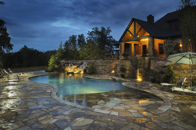 Multi level patios waterfalls pool utilizing the native for Pool design okc