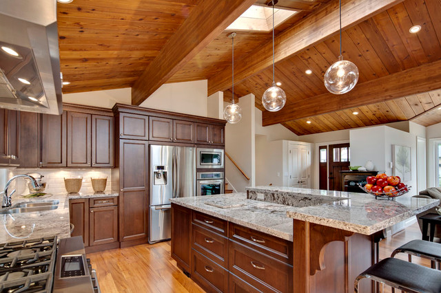 Kitchen with wood paneled ceiling and skylight - Transitional ...