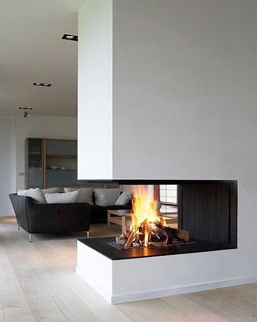 Corner fireplace - modern - family room -