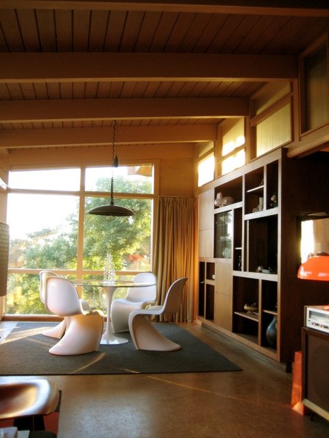 Dining Area with White Panton Chairs by Vitra modern-dining-room