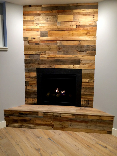 Recycled pallet and reclaimed wood paneling rustic-family-room