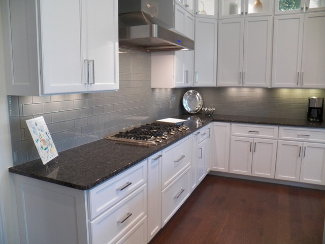 light grey glass kitchen backsplash