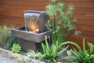 Small rectangle water fountain with built-in light.