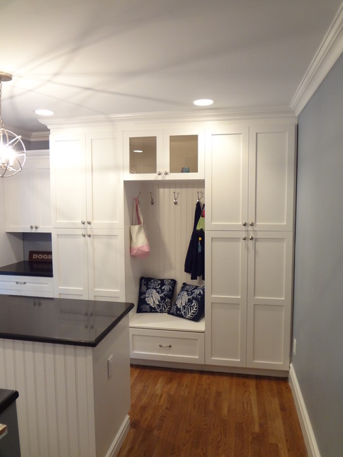 The Crystorama Solaris is a collection that's great for dramatic mudroom lighting. Photo credit: Laundry Room by Oakhurst Kitchen & Bath Remodelers Alfano Renovations- Kitchen & Bath Showroom