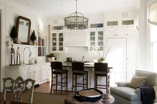 A smart combination of living, dining and kitchen spaces creates a ...