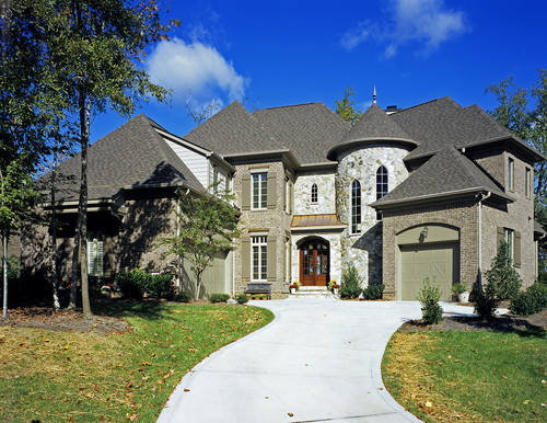 Ivory Stone and Brown Brick Exterior