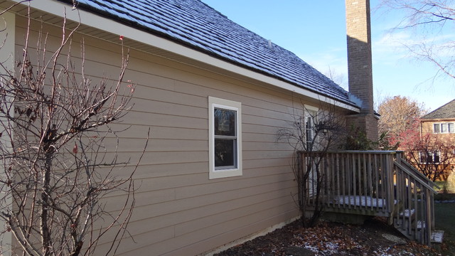 Fiber cement siding by James Hardie in Naperville traditional-exterior