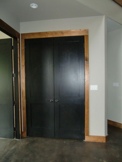 Black interior doors with wood (not white) trim. | Black interior doors