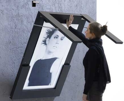 Collapsible table can be used to display artworks Table that acts as wall art when unused
