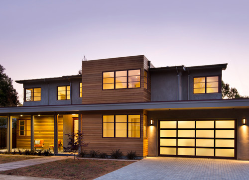 garage door windows blend in with this contemporary home