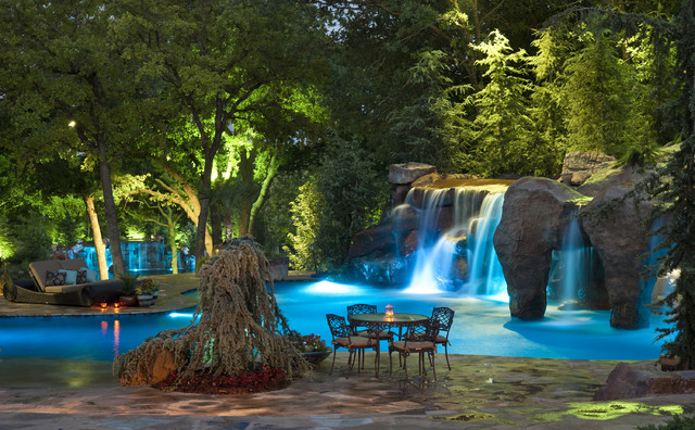 Cool pools in oklahoma with swim through grotto and for Pool design okc