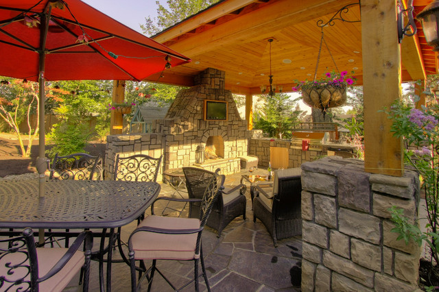 Outdoor living, gazebo, outdoor fireplace, water feature. traditional