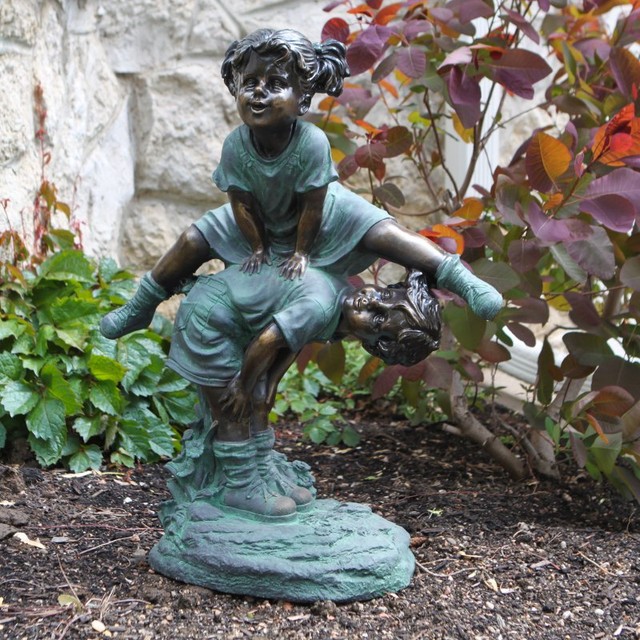 boy and girl sitting on bench garden statue hot girls boy and girl sitting on bench garden statue hot girls