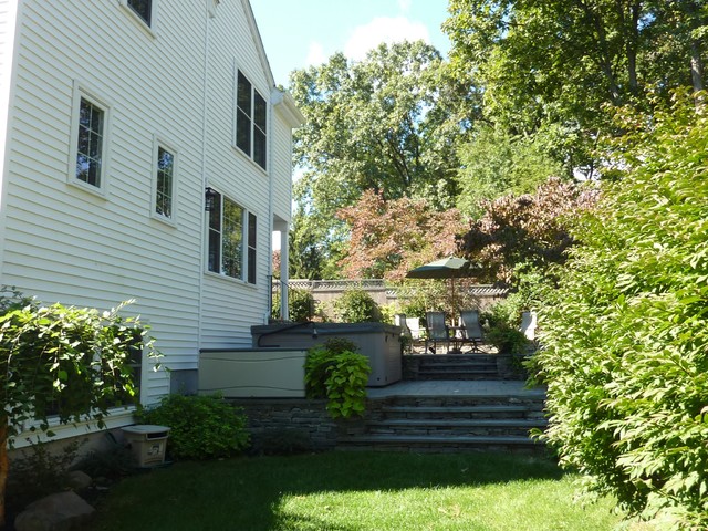 Making something special of a sloped backyard traditional patio