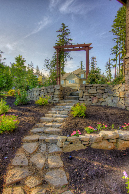 Outdoor living, gazebo, outdoor fireplace, water feature. traditional