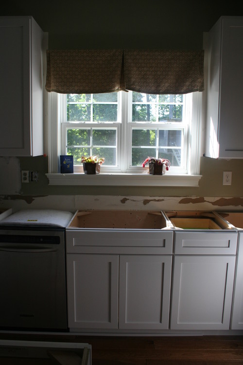 Kitchen sink NOT centered w/window. Which sink will disguise it?