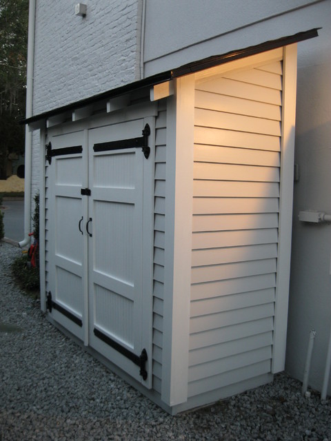 Small Storage along the side of a house traditional-garage-and-shed