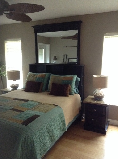Large mirror over bed.