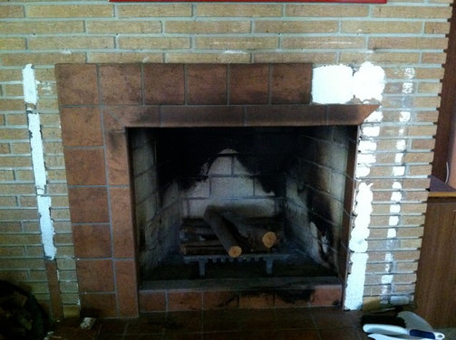 tile over brick fireplace