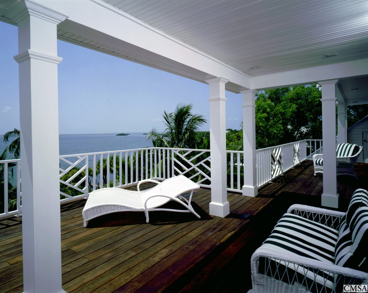 Tropical Porch by Clifford M. Scholz Architects Inc.