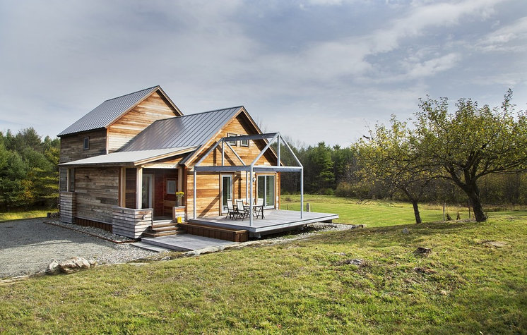 Farmhouse Exterior by ZeroEnergy Design
