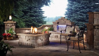 Elegant fire pit and water fall.