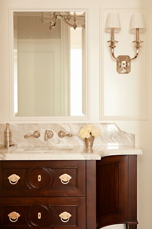 Gold faucet, lighting and cabinet hardware