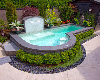 Elegant small wading pool with waterfall.