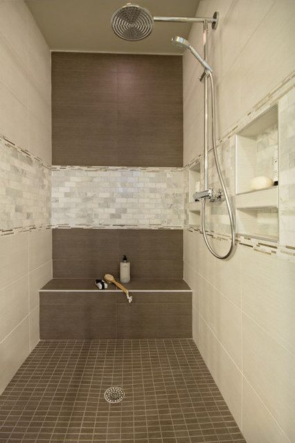 Brown and cream tile shower with Mother of Pearl accent tiles