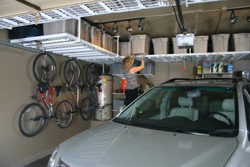 DIY garage organization may also include overhead, ceiling mounted  storage platforms