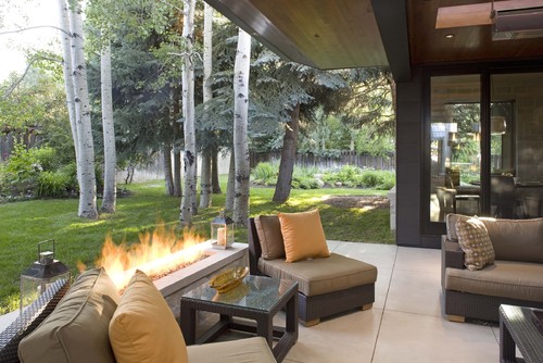 more outdoor entertaining is possible when your patio or deck has a cover, and possibly sides to block the wind