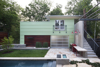 Contemporary small house exterior design with small pool.