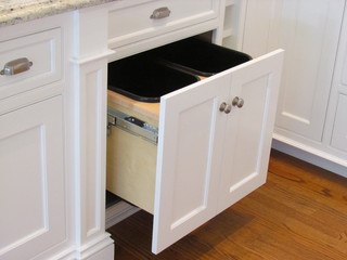 How to install a pull-out bin in a kitchen cupboard