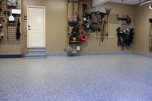 an epoxy floor coating is one of our garage ideas, to help keep the space cleaner
