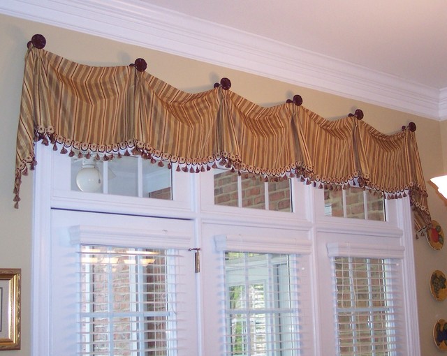 Great treatment for this transom window. Valance hung on decorative ...