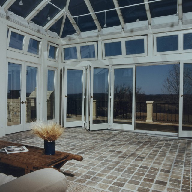 Sunroom with folding doors and motorized transom windows - Contemporary ...