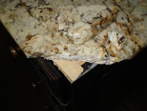 How Can I Repair A Granite Countertop Where Multpile Chunks Have