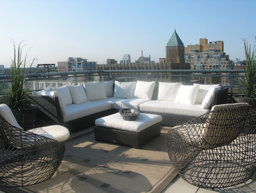 outdoor wicker sectional furniture on Toronto rooftop