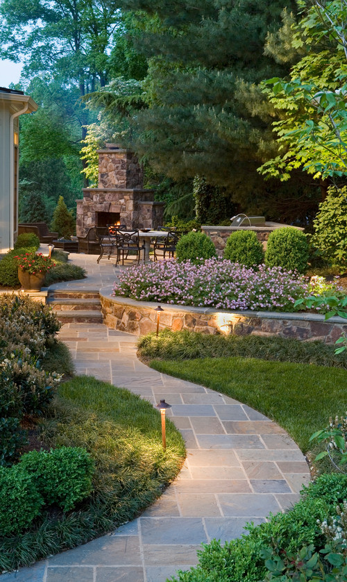 A sophisticated no grass backyard more towards the traditional layout.