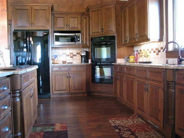 Kitchen with corner oven cabinet