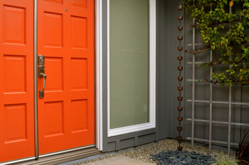 front door painted with benjamin moore orange parrot